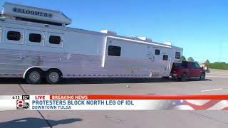 Truck and trailer drive through crowd protesting in Tulsa on live TV [upl. by Kort396]