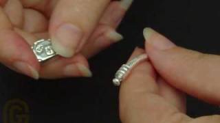 How to add charms to a Pandora Bracelet [upl. by Atirys]